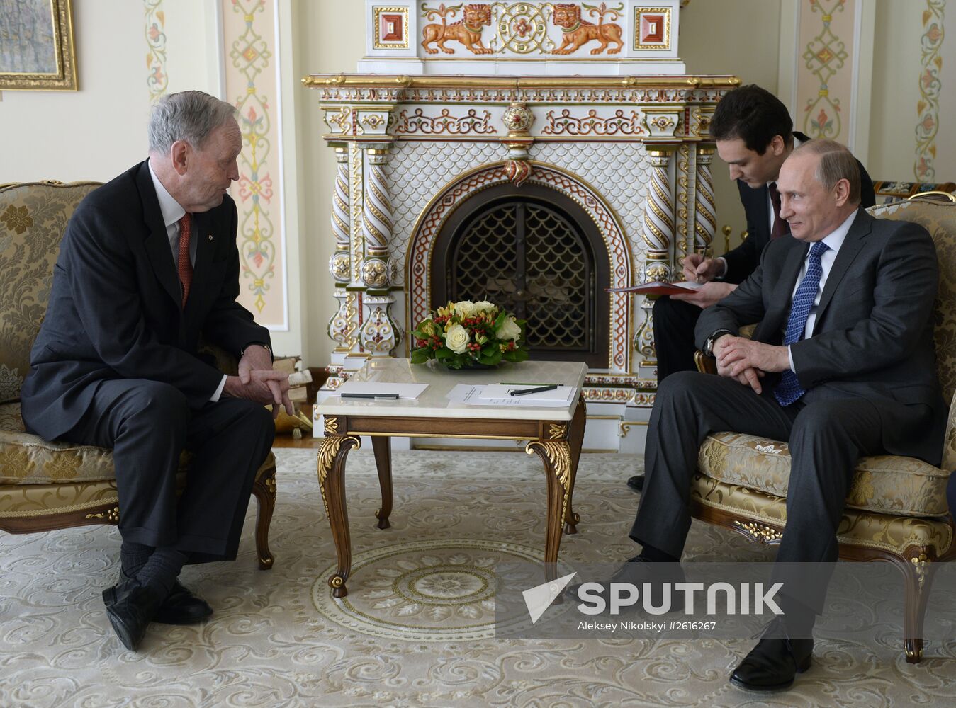 President Vladimir Putin meets with former Canadian Premier Jean Cretien