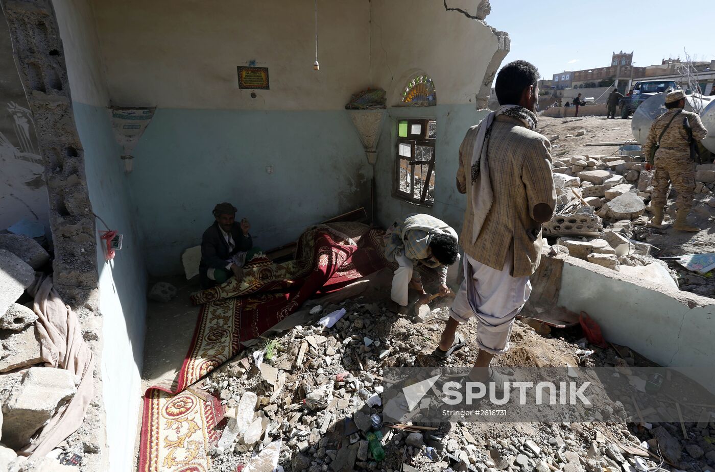 Aftemath of Saudi-led coalition's air raids in Yemeni capital Sanaa