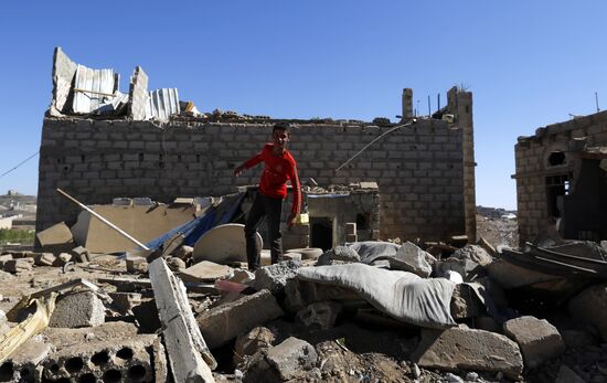Aftemath of Saudi-led coalition's air raids in Yemeni capital Sanaa
