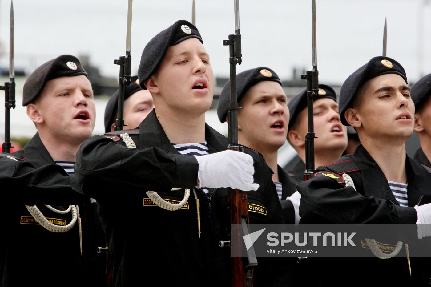 Lighting a torch at the Pacific Fleet's Combat Glory memorial in Vladivostok