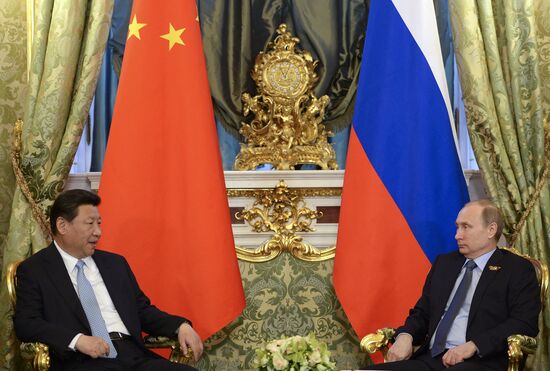 President Vladimir Putin meets with Chinese President Xi Jinping