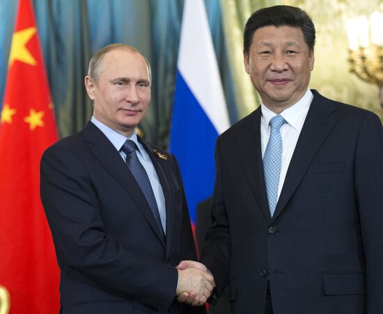 President Vladimir Putin meets with Chinese President Xi Jinping