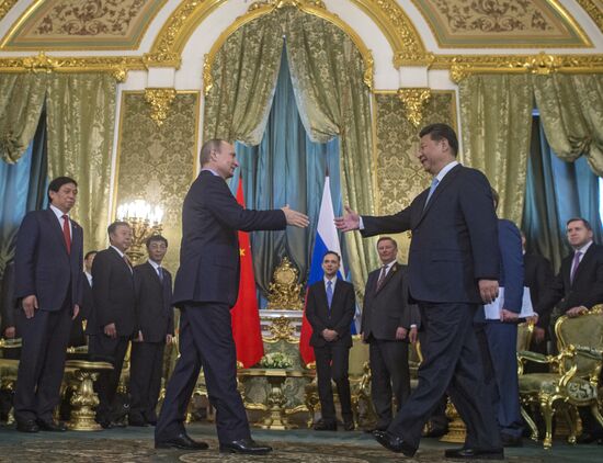 President Vladimir Putin meets with Chinese President Xi Jinping