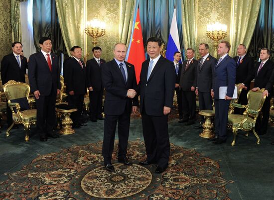 President Vladimir Putin meets with Chinese President Xi Jinping