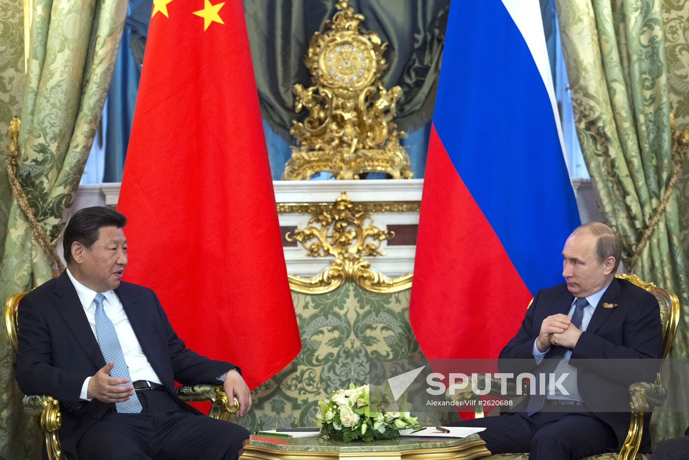 Russian President Vladimir Putin meets with Chinese President Xi Jinping