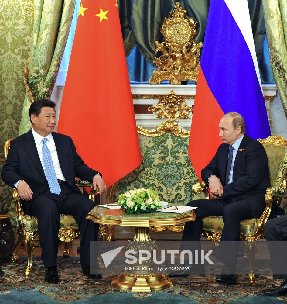 President Vladimir Putin meets with Chinese President Xi Jinping