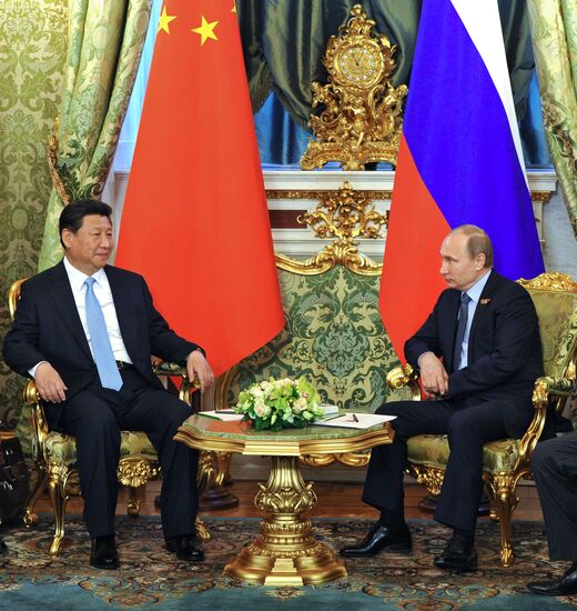President Vladimir Putin meets with Chinese President Xi Jinping