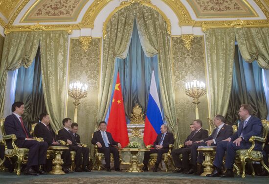President Vladimir Putin meets with Chinese President Xi Jinping