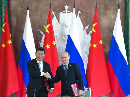President Vladimir Putin meets with Chinese President Xi Jinping