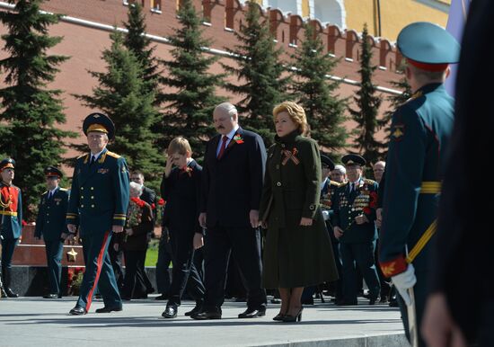 President of Belarus Alexander Lukashenko lays flowers at Tomb of the Unknown Soldier