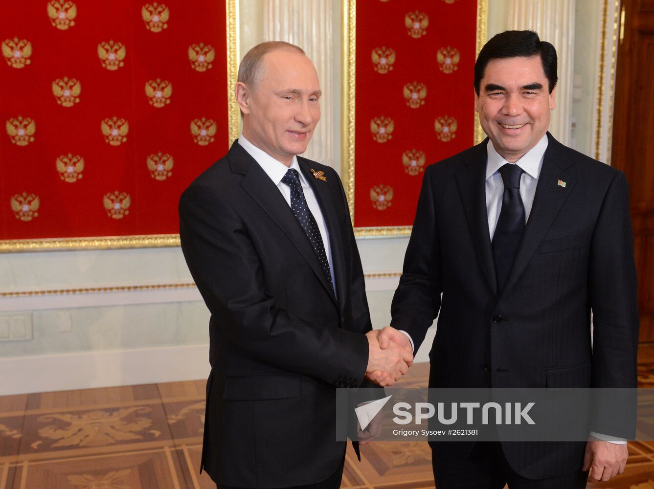 Russian President Vladimir Putin welcomes foreign delegation heads and honorary guests