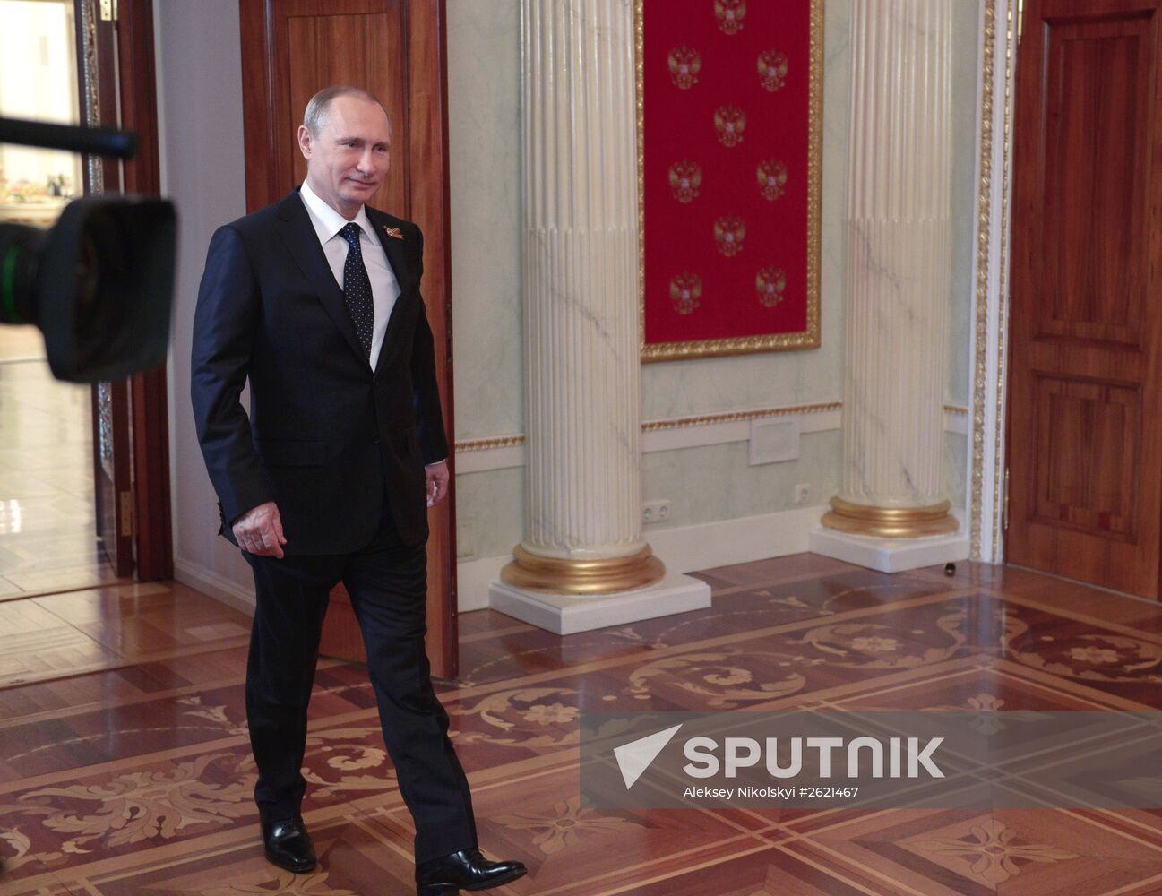 Russian President Vladimir Putin welcomes foreign delegation heads and honorary guests