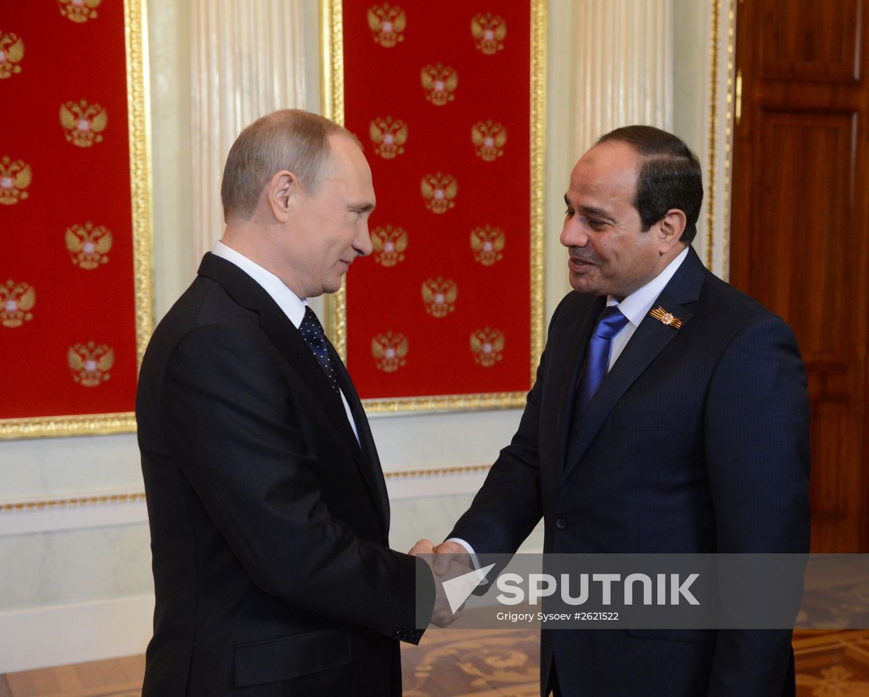 Russian President Vladimir Putin welcomes foreign delegation heads and honorary guests