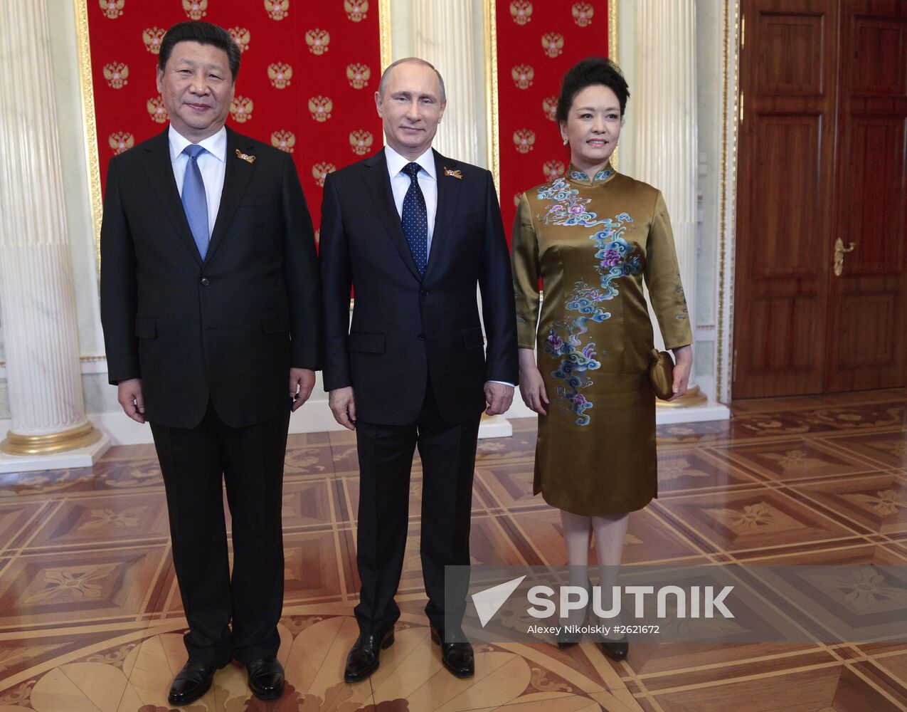 Russian President Vladimir Putin welcomes foreign delegation heads and honorary guests