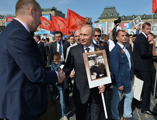 Russian President Vladimir Putin participates in march of Immortal Regiment in downtown Moscow