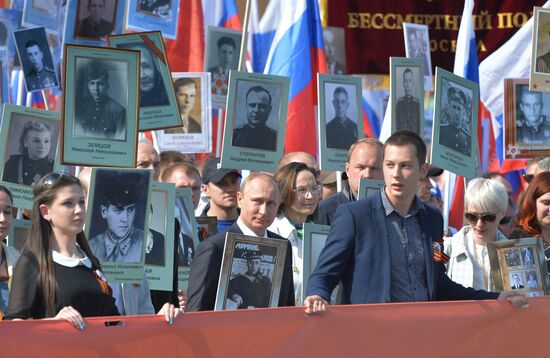 Russian President Vladimir Putin participates in march of Immortal Regiment in downtown Moscow