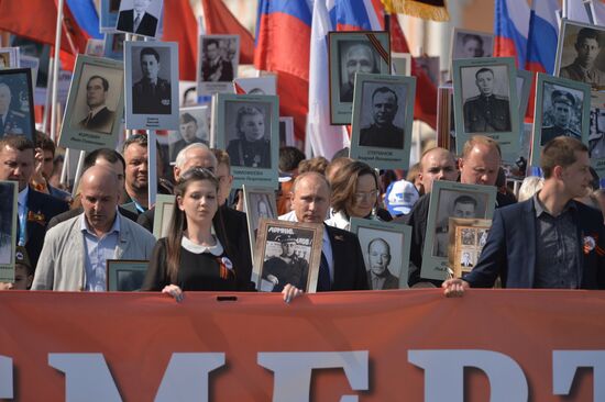 Russian President Vladimir Putin participates in march of Immortal Regiment in downtown Moscow