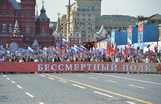 Russian President Vladimir Putin participates in march of Immortal Regiment in downtown Moscow