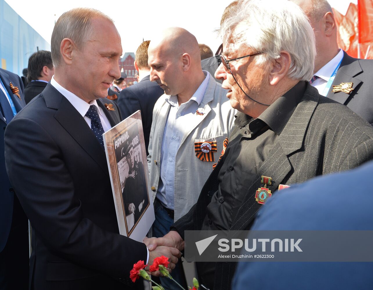 Russian President Vladimir Putin participates in march of Immortal Regiment in downtown Moscow