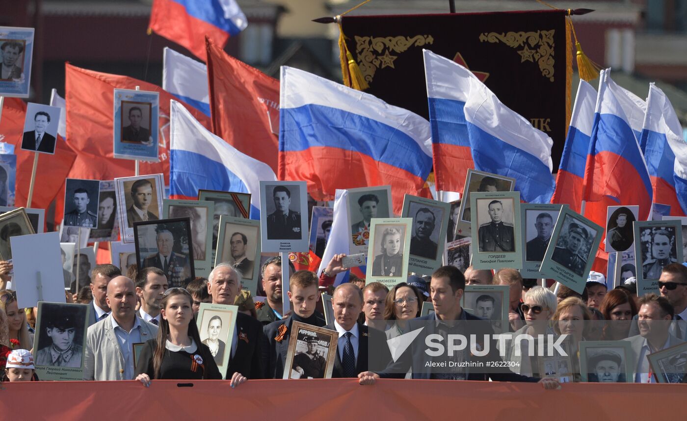 Russian President Vladimir Putin participates in march of Immortal Regiment in downtown Moscow