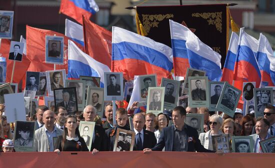 Russian President Vladimir Putin participates in march of Immortal Regiment in downtown Moscow