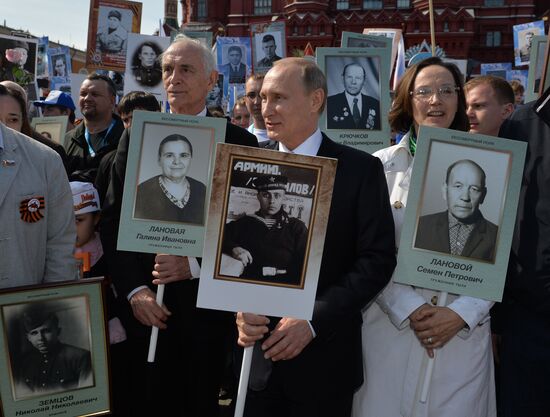 Russian President Vladimir Putin participates in march of Immortal Regiment in downtown Moscow
