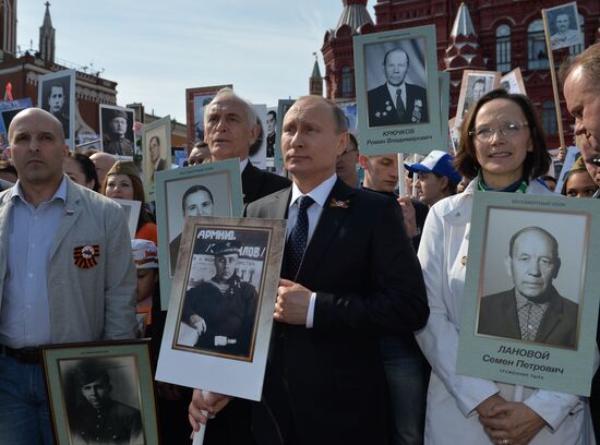 Russian President Vladimir Putin participates in march of Immortal Regiment in downtown Moscow