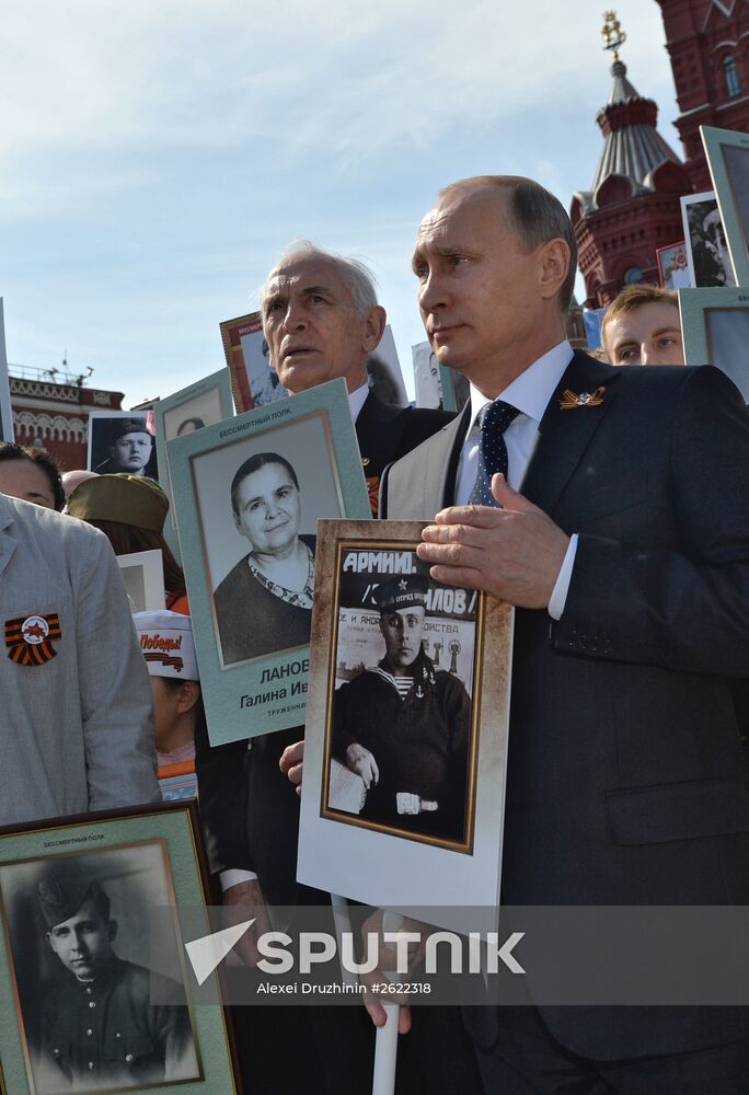 Russian President Vladimir Putin participates in march of Immortal Regiment in downtown Moscow