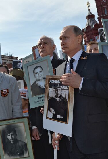 Russian President Vladimir Putin participates in march of Immortal Regiment in downtown Moscow