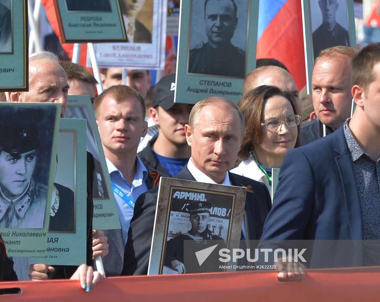 Russian President Vladimir Putin participates in march of Immortal Regiment in downtown Moscow
