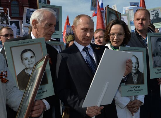 Russian President Vladimir Putin participates in march of Immortal Regiment in downtown Moscow