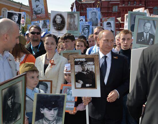 Russian President Vladimir Putin participates in march of Immortal Regiment in downtown Moscow