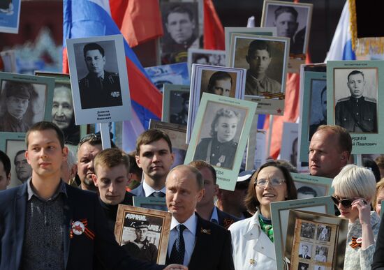 Russian President Vladimir Putin participates in march of Immortal Regiment in downtown Moscow