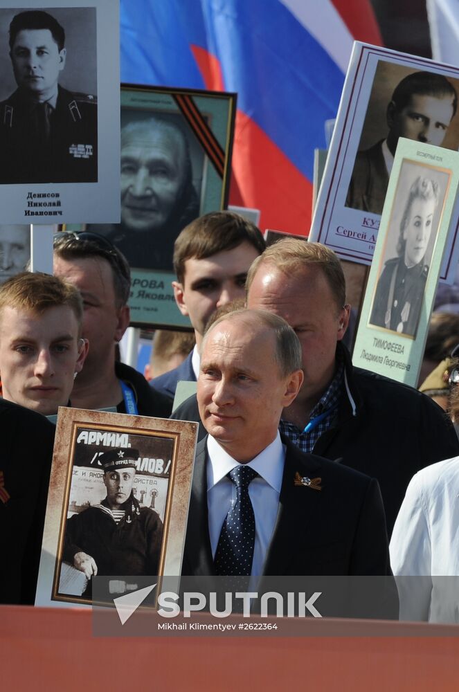 Russian President Vladimir Putin participates in march of Immortal Regiment in downtown Moscow