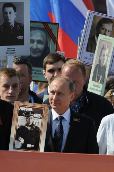 Russian President Vladimir Putin participates in march of Immortal Regiment in downtown Moscow
