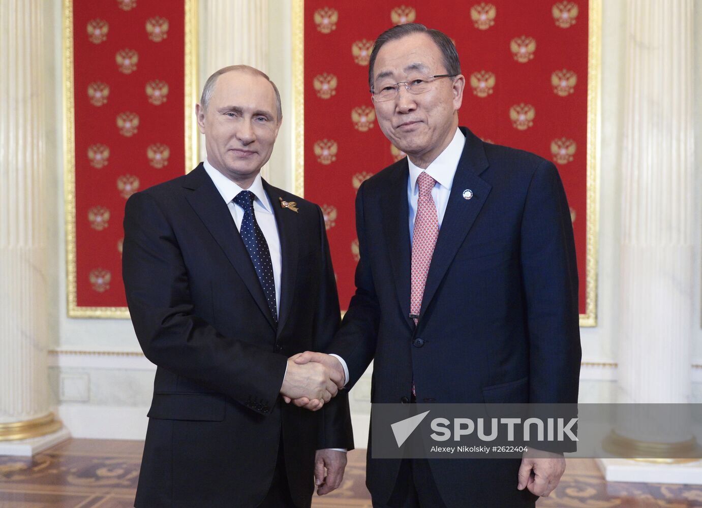 Russian President Vladimir Putin welcomes foreign delegation heads and honorary guests