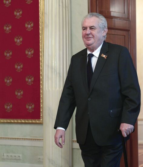 Russian President Vladimir Putin welcomes foreign delegation heads and honorary guests