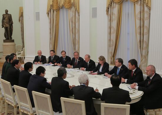 President of Russia Vladimir Putin meets with President of Vietnam Truong Tan Sang