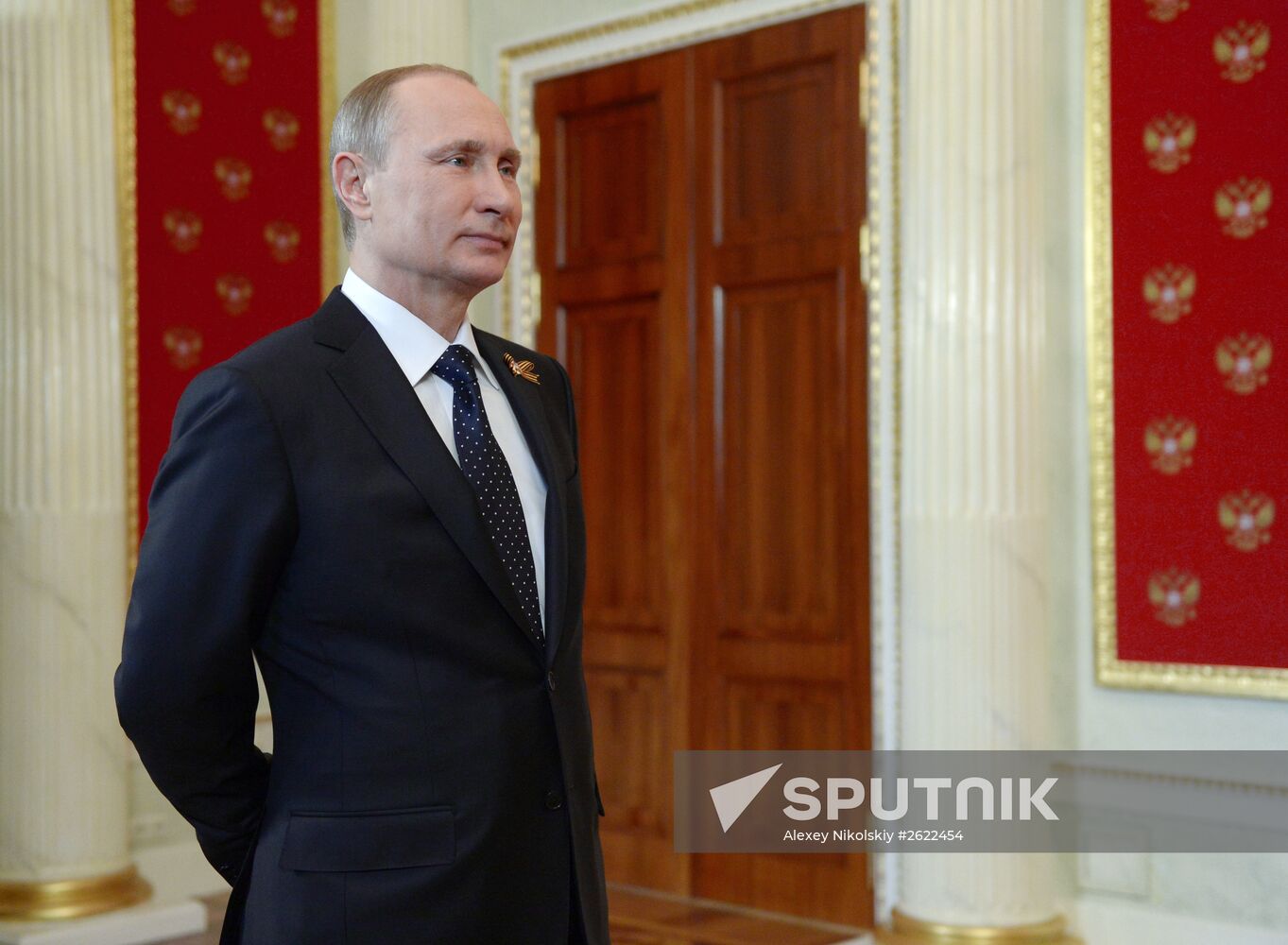 Russian President Vladimir Putin welcomes foreign delegation heads and honorary guests