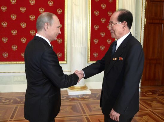 Russian President Vladimir Putin welcomes foreign delegation heads and honorary guests