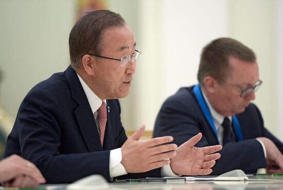 Russian President Vladimir Putin meets with UN Secretary-General Ban Ki-moon