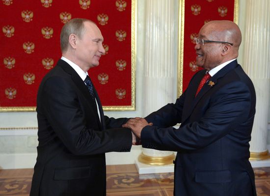 Russian President Vladimir Putin welcomes foreign delegation heads and honorary guests