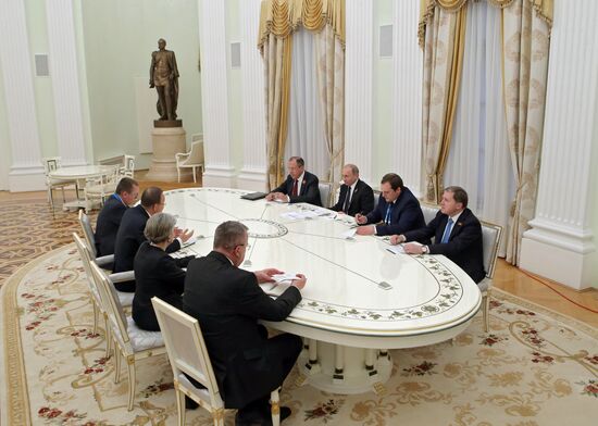 Russian President Vladimir Putin meets with UN Secretary-General Ban Ki-moon