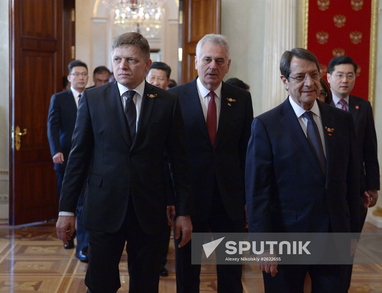 Russian President Vladimir Putin welcomes foreign delegation heads and honorary guests