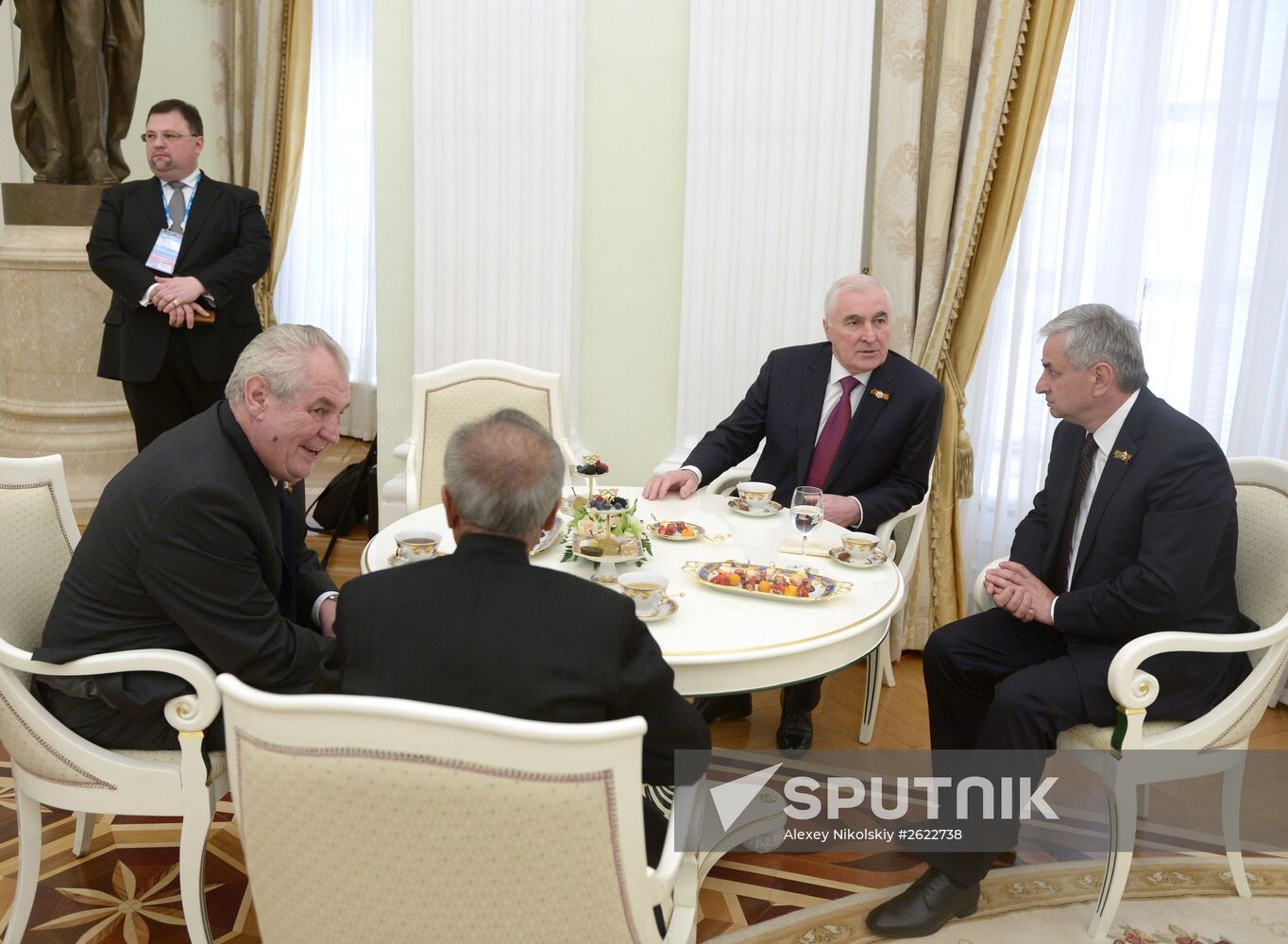 Russian President Vladimir Putin welcomes foreign delegation heads and honorary guests