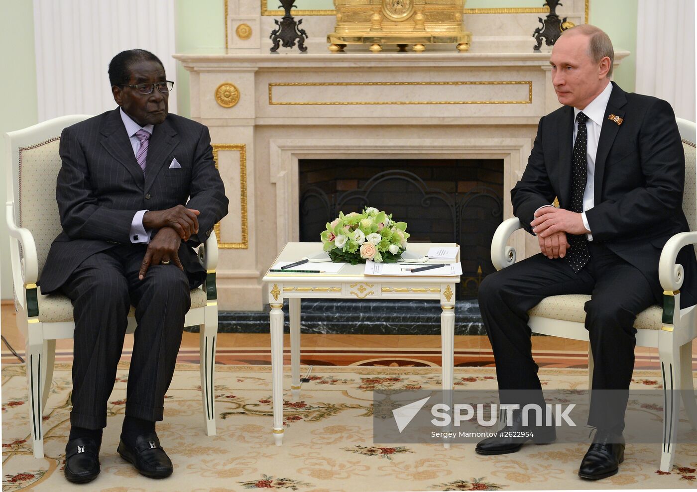 Russian President Vladimir Putin meets with President of Zimbabwe Robert Mugabe