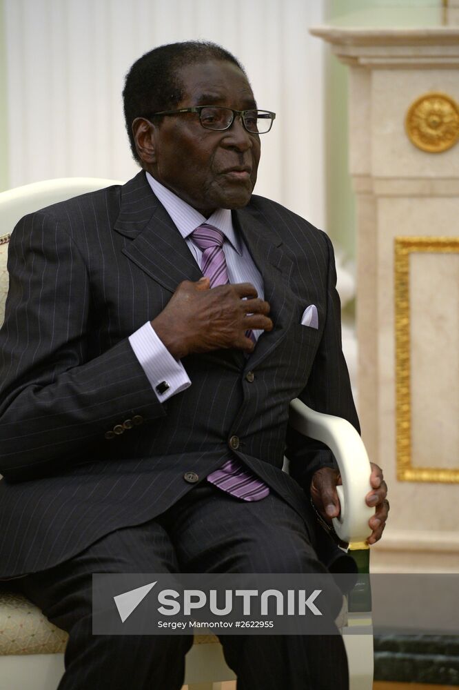 Russian President Vladimir Putin meets with President of Zimbabwe Robert Mugabe