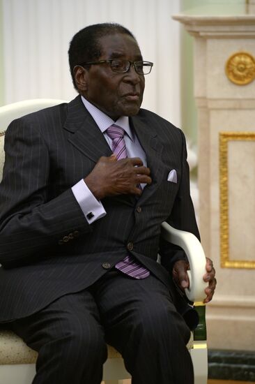 Russian President Vladimir Putin meets with President of Zimbabwe Robert Mugabe