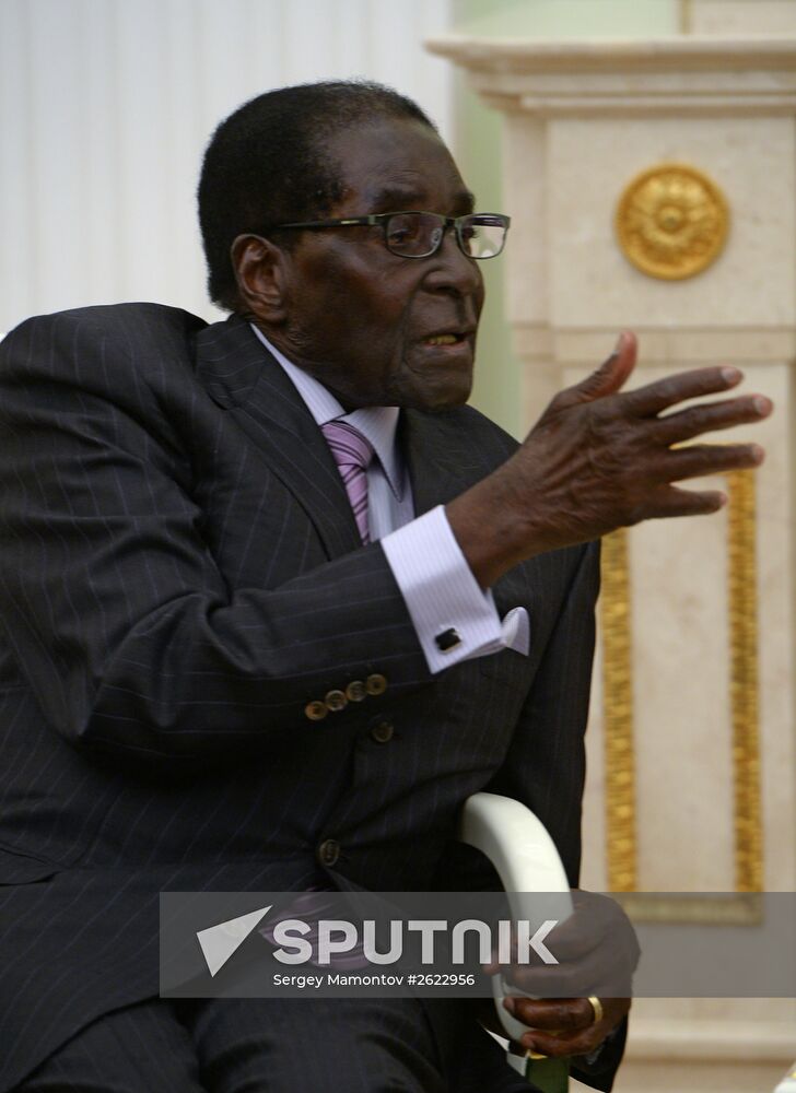 Russian President Vladimir Putin meets with President of Zimbabwe Robert Mugabe