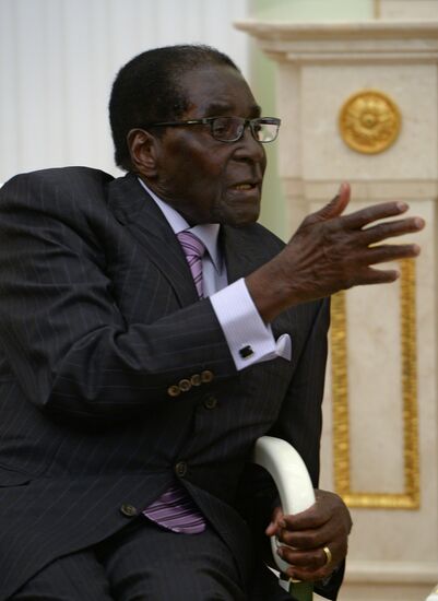 Russian President Vladimir Putin meets with President of Zimbabwe Robert Mugabe